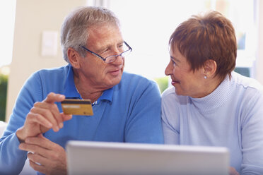 Senior couple shopping online at home - ZEF001073