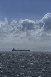 Spain, Andalusia, Tarifa, cargo ship on the ocean - KBF000182