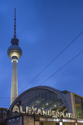 Germany, Berlin, view to television tower and train station at Alexanderplatz by twilight - NKF000190