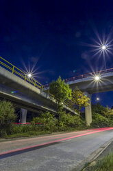 Germany, Hamburg, two bridges crossing each other at night - NKF000192