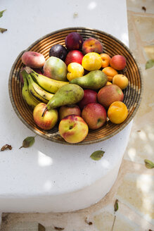 Spain, organic food, basket full of fruits - TKF000403