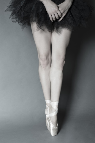 Legs of young ballet dancer stock photo