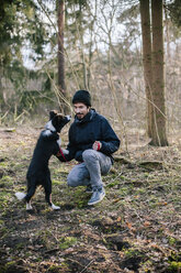 Germany, Man with Border Collie - DWF000198