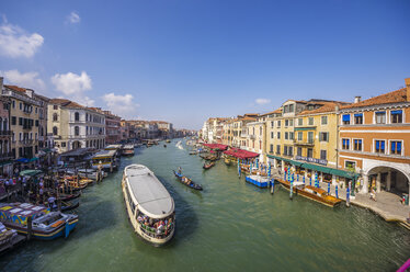 Italy, Veneto, Venice, Canal with excursion boat - THA000619