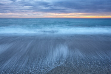 Spain, Andalusia, Natural Park of Cabo de Gata-Nijar, beach and ocean at dusk - DSGF000163