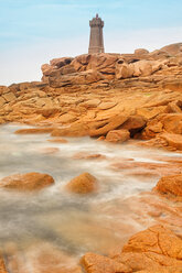 France, Brittany, Lighthouse at Cote de Granit Rose - DSGF000755