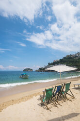 Mexico, Banderas Bay, Mismaloya Beach with three beach chairs - ABAF001509