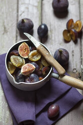Casserolle of sliced figs and plums for making jam - SBDF001297