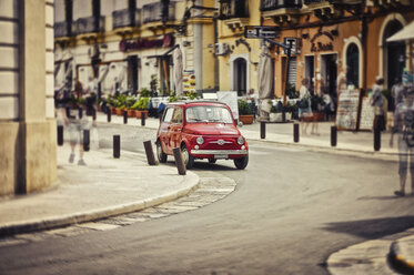 Italy, Apulia, Gallipoli, parking red Fiat 500, multiple exposure - DIKF000121