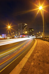 South Africa, Cape Town, light trails at busy street by night - ZEF001234