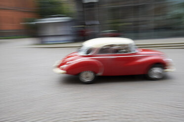 Germany, driving red Auto Union 1000 S - BSCF000445