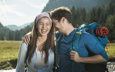 Austria, Tyrol, Tannheimer Tal, portrait of young hiker couple - UUF002097