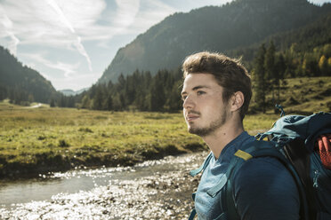 Austria, Tyrol, Tannheimer Tal, portrait of young hiker - UUF002102