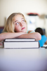 Girl in classroom thinking - ZEF001412