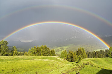 Italy, South Tyrol, Seiser Alm, Double Rainbow in front of Langkofel - UMF000731