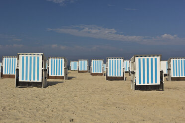 Germany, Mecklenburg-Western Pomerania, Warnemuende, beach chairs on a beach - MELF000021