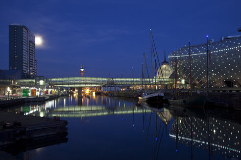 Germany, Bremen, Bremerhaven, Old Harbour, Museum Klimahaus and Bridge over Weser river - OLE000044