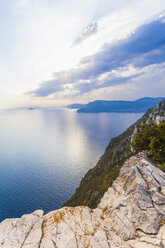 France, Provence-Alpes-Cote d'Azur, Provence, Mediterranean coast, near La Clotat and Cassis, Corniche des Cretes, Cliff line against the sun - WDF002649