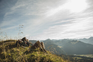 Austria, Tyrol, Tannheimer Tal, young hiker having a rest - UUF002185