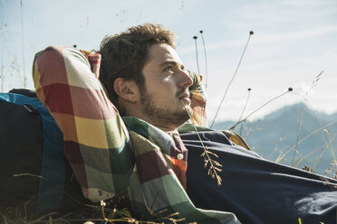 Austria, Tyrol, Tannheimer Tal, young hiker having a rest - UUF002184