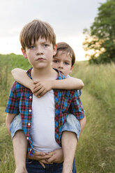 Portrait of of two serious looking little boys - FKIF000053