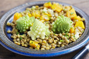 Dish of lentil salad with pumpkin and romanesco - HAWF000487