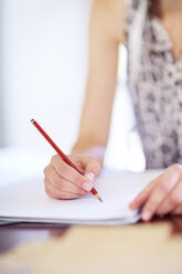 Close-up of woman drawing on paper - ZEF001662