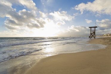 Spain, Baleares, Mallorca, woman walking along the seafront at twilight - MSF004325