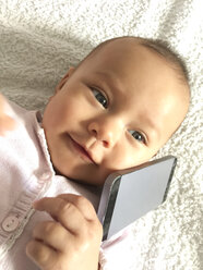 Baby with iPhone, Freiburg, Germany - DRF001143