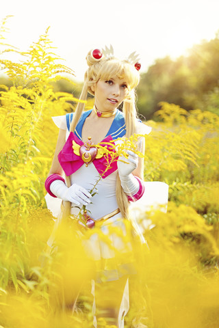 Woman wearing costume of Pretty Guardian Sailor Moon stock photo