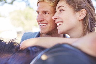 Smiling young couple with horse - ZEF001728