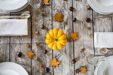 Autumnal laid table with yellow pumpkin - LVF002091