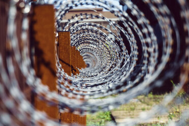 Germany, Dortmund, former steel mill Phoenix West, razor barbed wire - HOHF001082