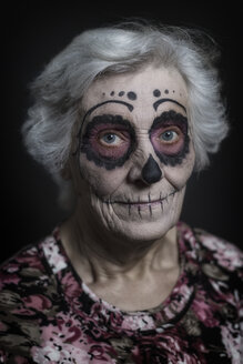 Portrait of senior woman with sugar skull make-up - STB000199