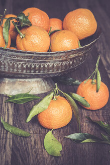 Zinc bowl of tangerines on dark wood - SARF000969