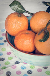 Bowl of tangerines on cloth - SARF000968