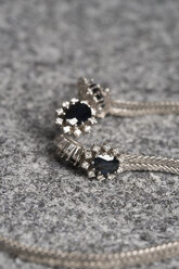 Necklace made of white gold with sapphires and diamonds on grey textile - MY000661