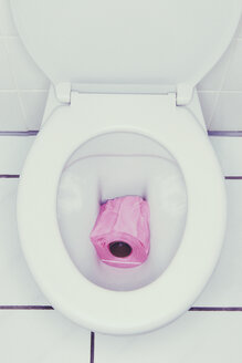 Rosa Toilettenpapier in der Toilette - UWF000217
