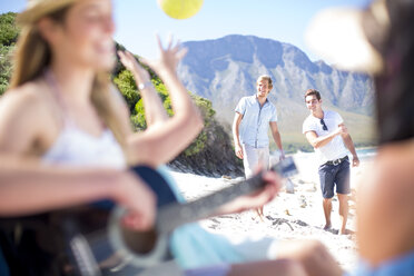 Happy friends on beach - ZEF002425