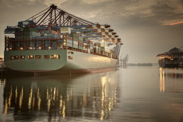 Germany, Hamburg, Container Terminal, Container ship in the evening - ROMF000025