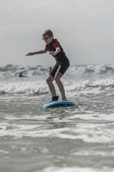 Boy learning surfboarding - PAF001045