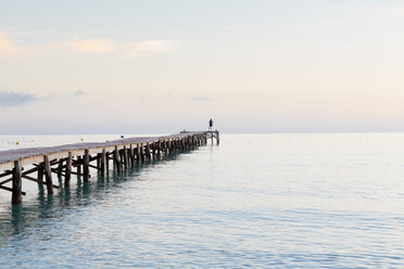 Spain, Balearic Islands, Majorca, one person standing on a jetty in the morning - MSF004337