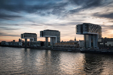 Germany, North Rhine-Westphalia, Cologne, view to Crane Houses at Rheinau Harbour at twilight - ELF001408