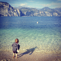 Italy, Brenzone sul Garda, girl at Lake Garda - LVF002222