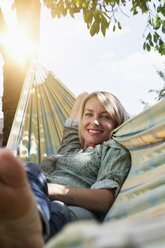 Relaxed mature woman in hammock - RBF001959