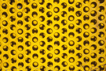 Part of yellow perforated board - WIF001173