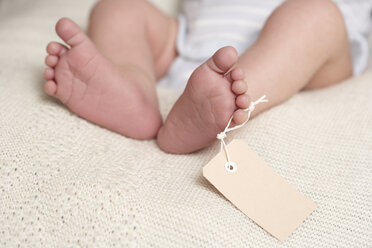 Baby's foot, low section (3-6 months), close-up stock photo