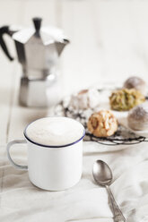 Mug of Cappuccino, Italian almond cookies and espresso can - SBDF001488