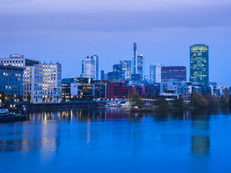 Germany, Hesse, Frankfurt, Gutleutviertel, Westhafen in the evening, Westhafen Tower in the background - AMF003355