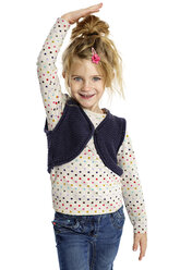 Blond little girl presenting her size in front of white background - GDF000626